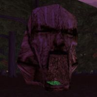 Empyrean Stone Head that contains the Entrance portal to Swamp Ruin.